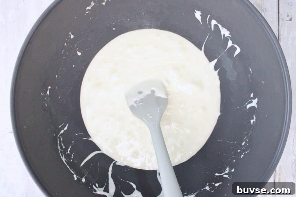 melt butter and mini marshmallows in a large bowl
