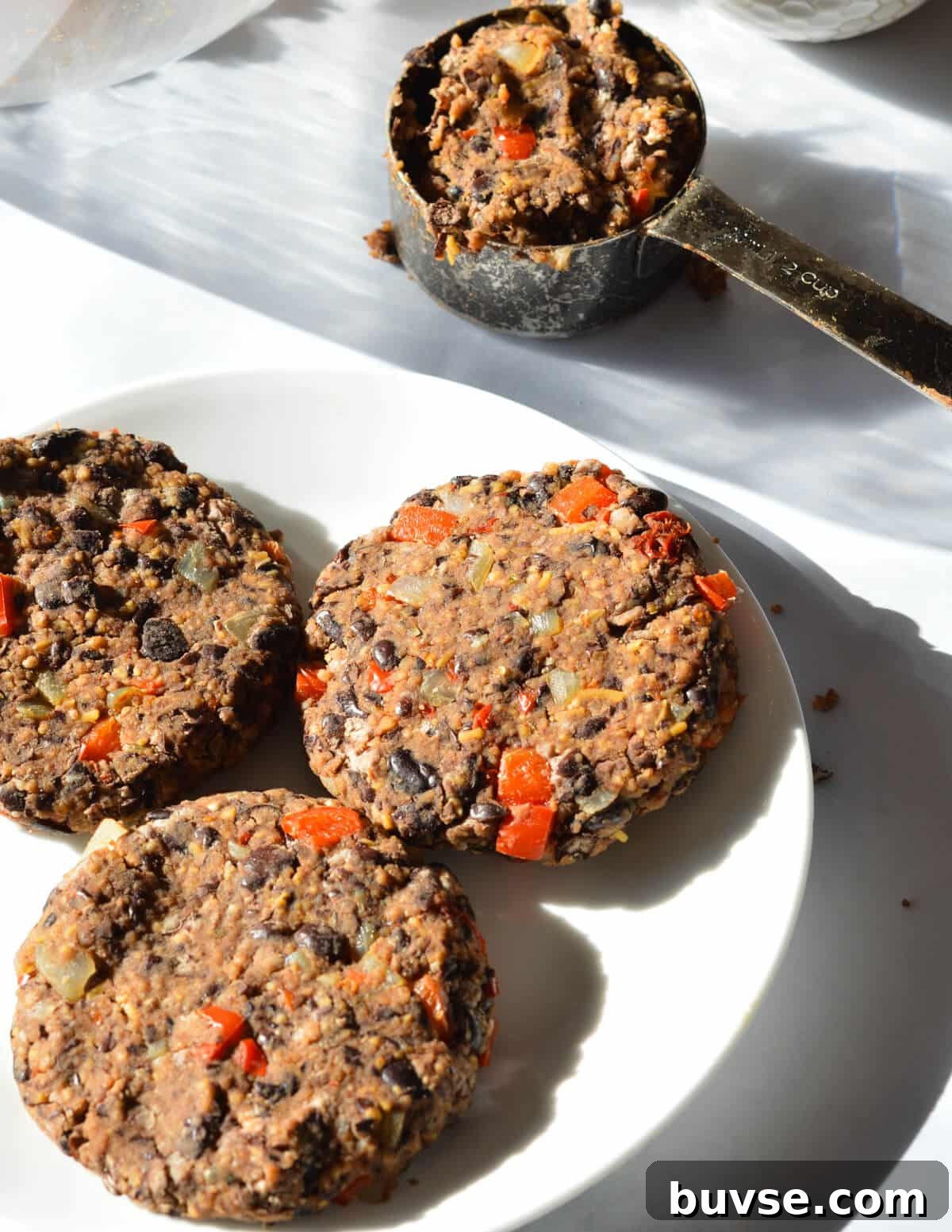 black bean patties on a plate.