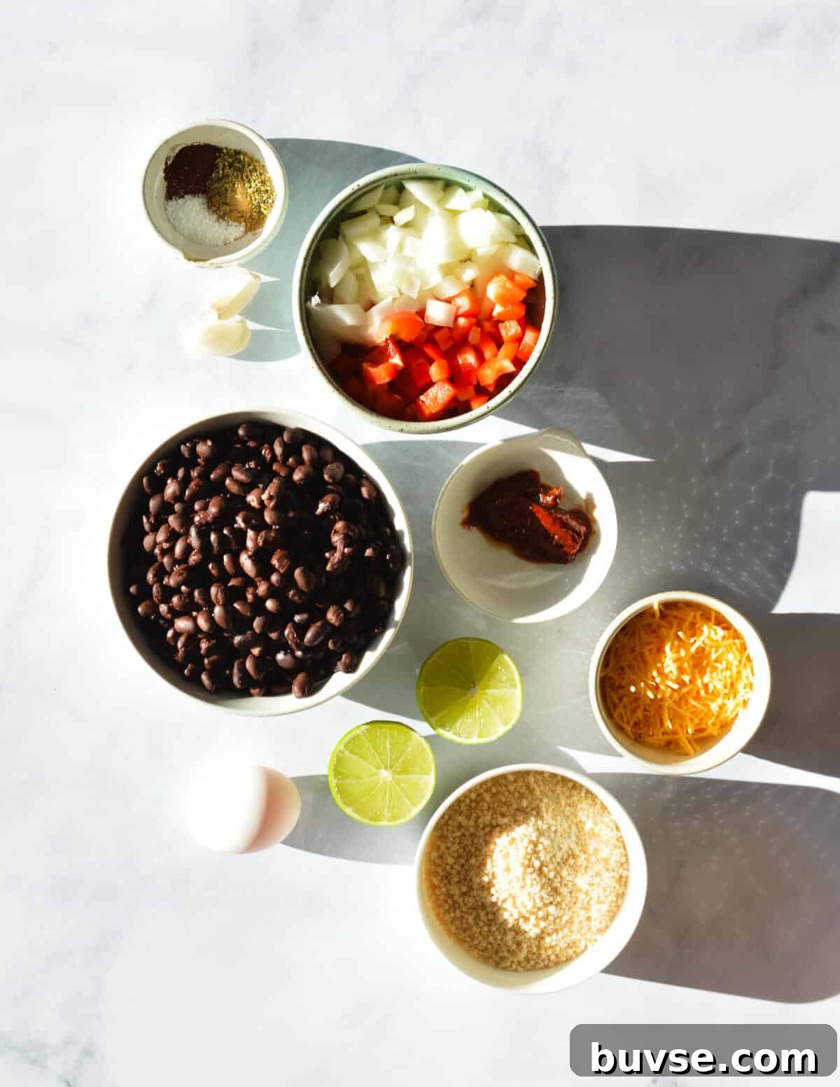 spices, peppers and onions, black beans, chipotle, lime, cheddar cheese, bread crumbs.