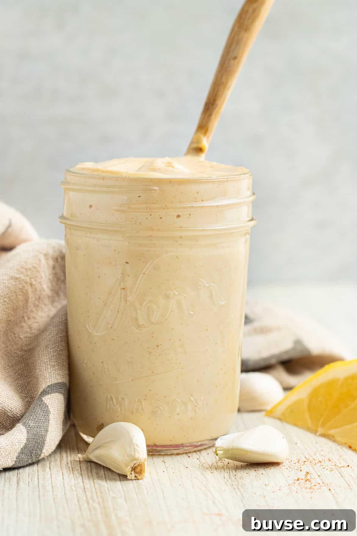 Homemade Dijon Aioli Recipe 3 Jar of aioli with wooden spoon