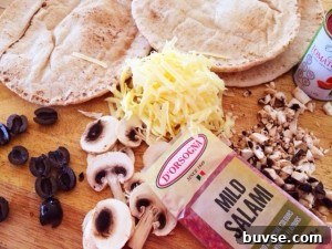 Pita pizzas before baking