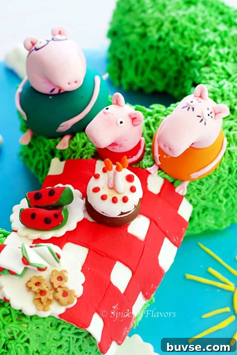 How to Make a Peppa Pig 3rd Birthday Cake 6 image showing fondant accents of peppa pig and family along with picnic basket placed on peppa pig birthday cake
