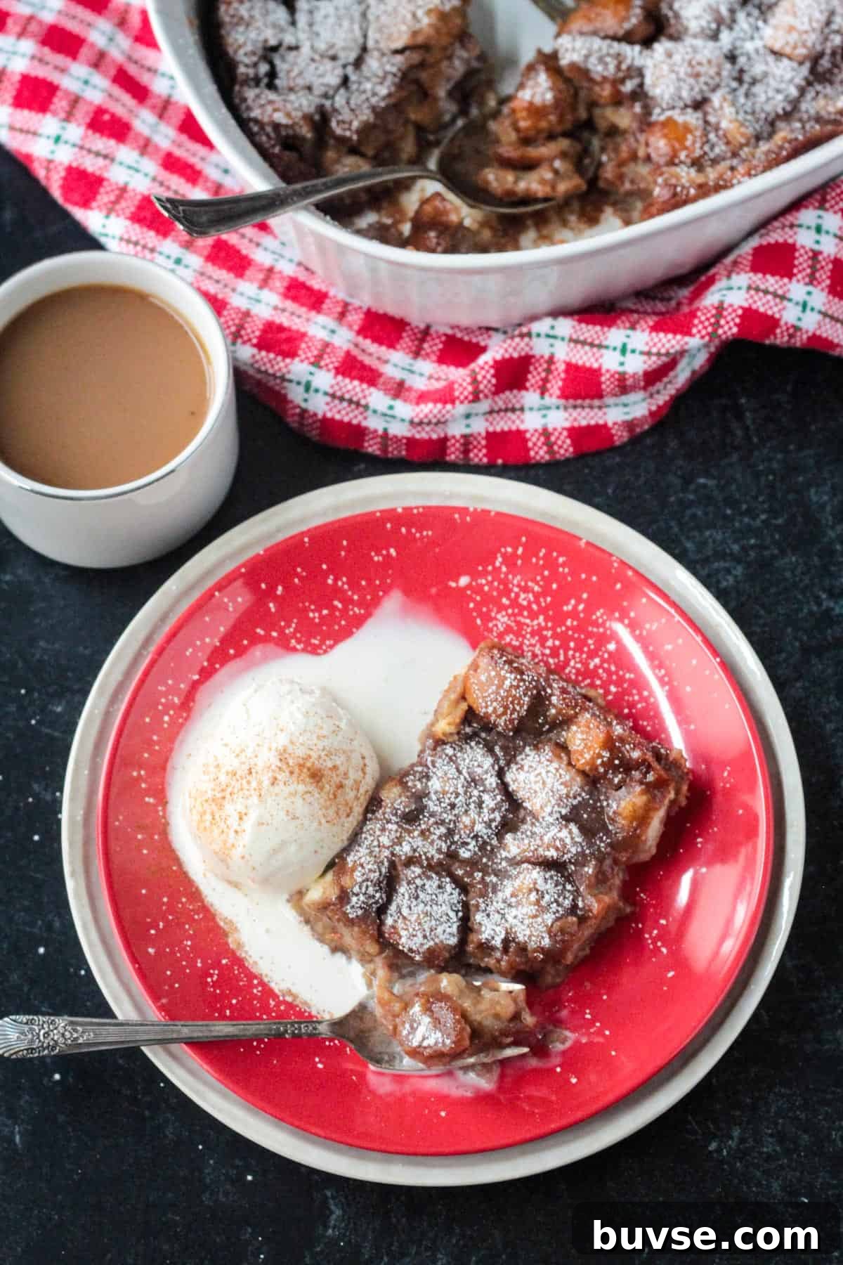 Creamy Vegan Bread Pudding Recipe with Cinnamon 16 One bite of bread pudding on a fork.