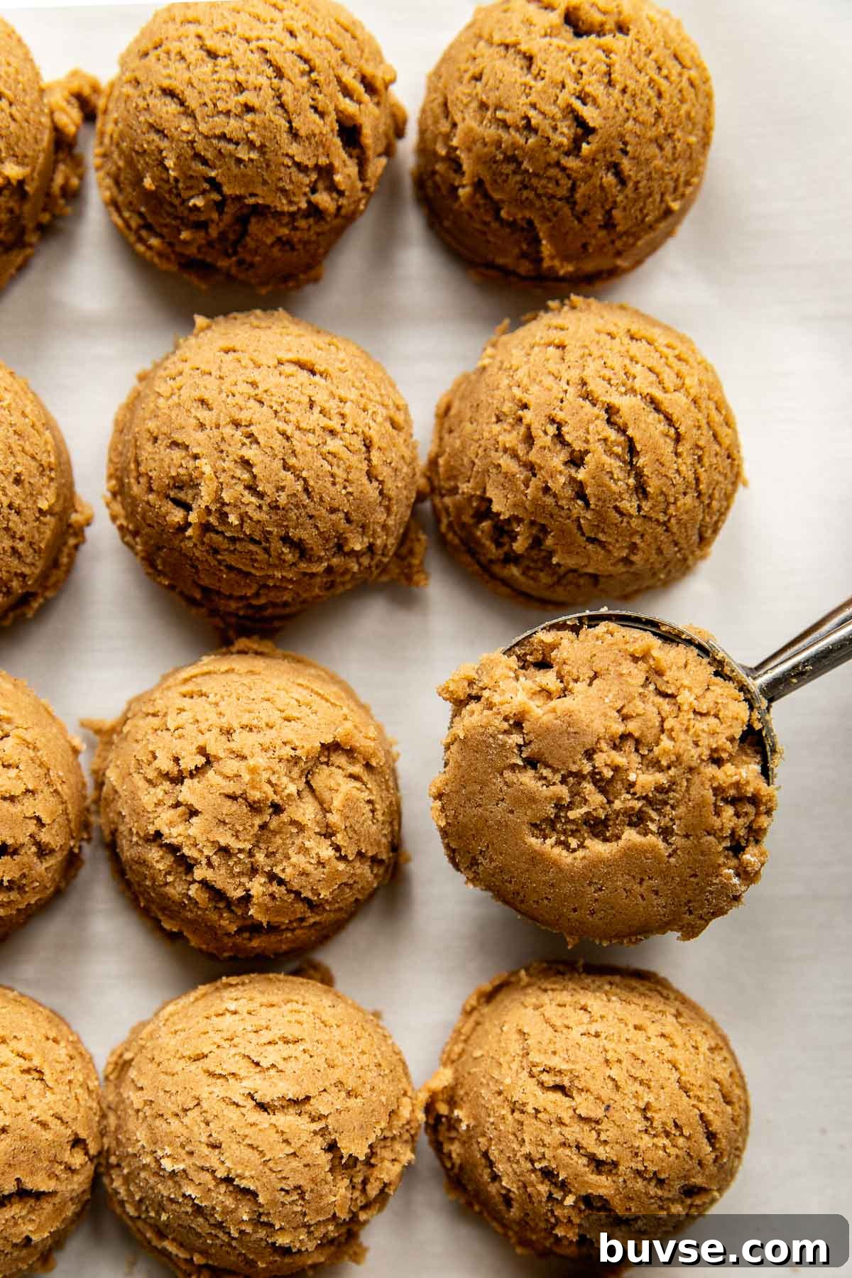 an up close image of scooped cookie dough.
