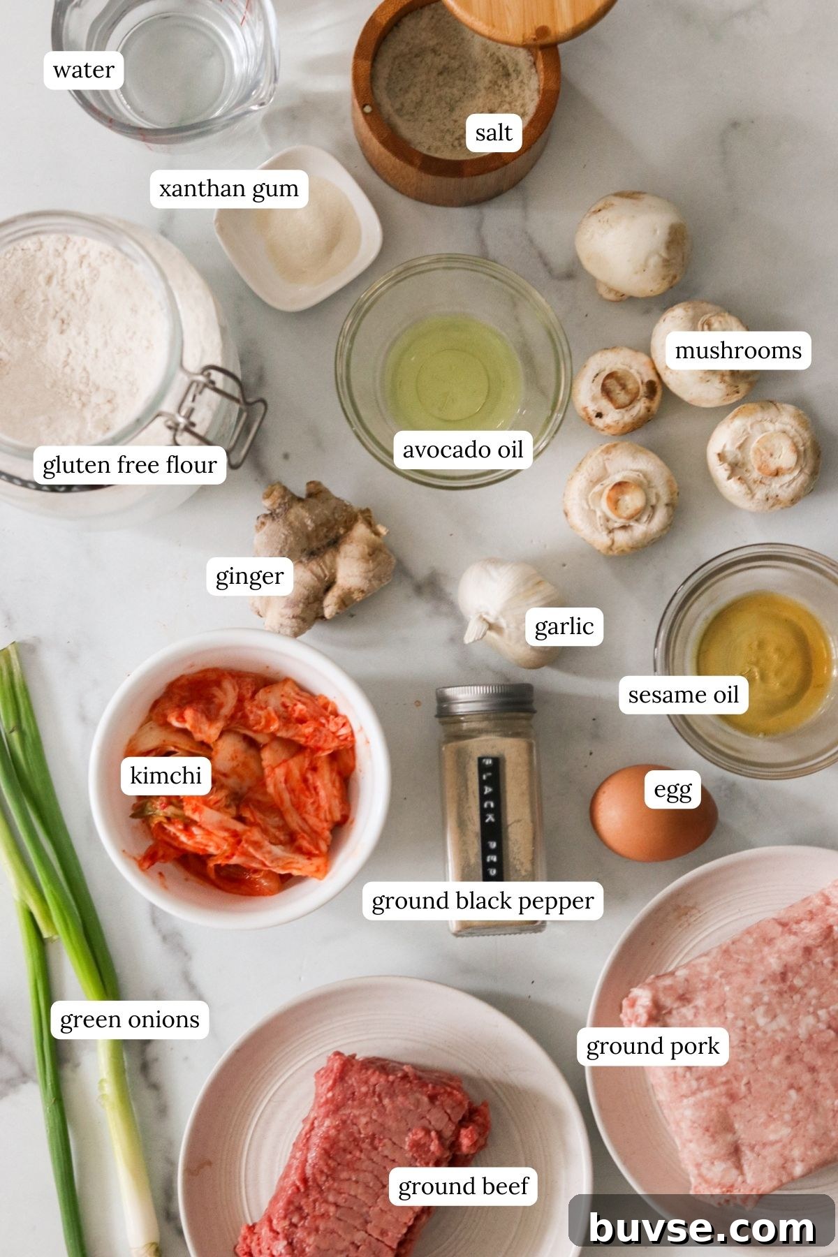 Ingredients in small bowls for mandu and gluten free dumpling wrappers