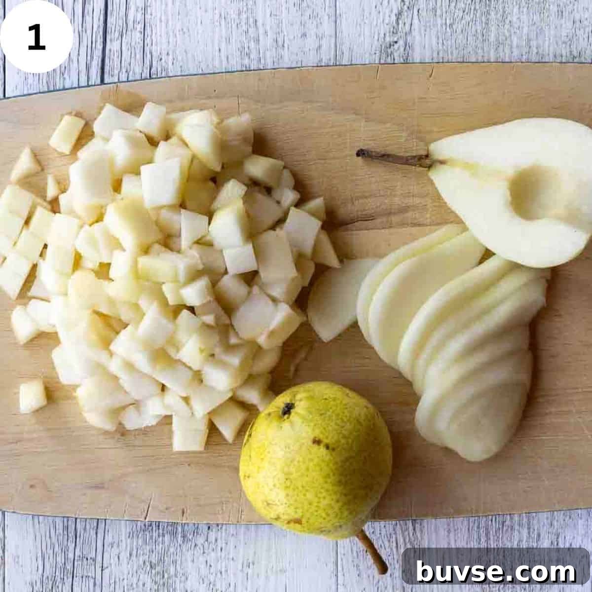 Pears in various stages of peeling and dicing.