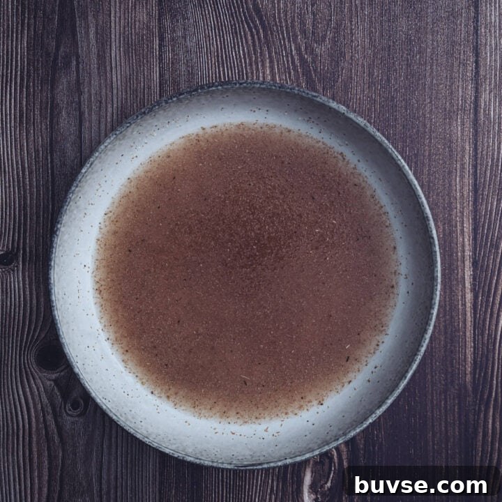 Gluten-Free Buckwheat Pita Bread Recipe 5 psyllium husk gel mixed in a large ceramic bowl.