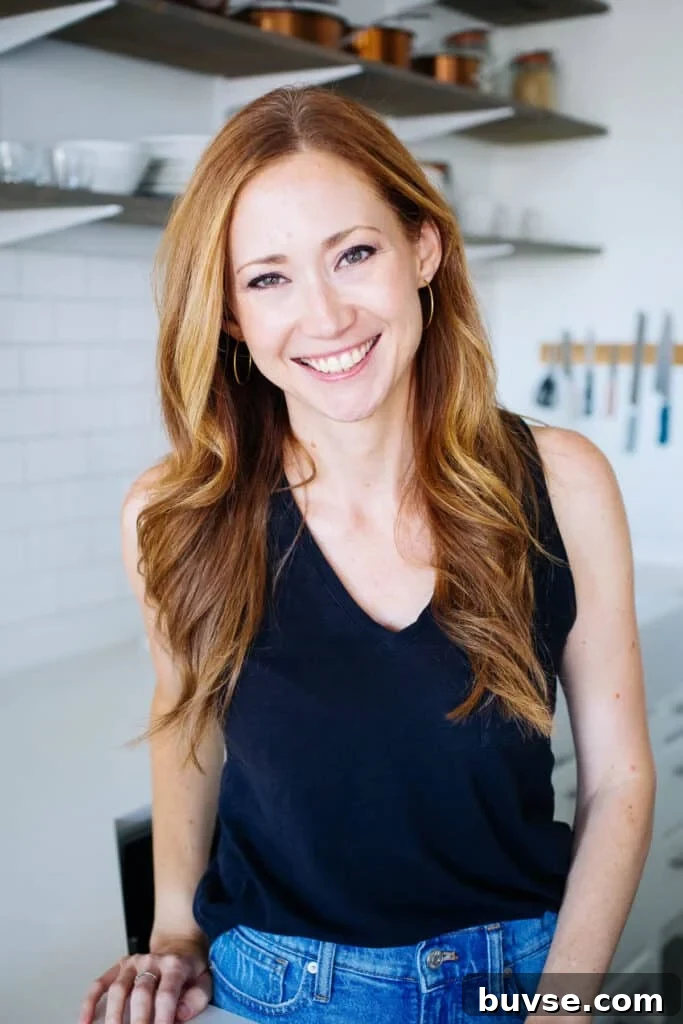 Tessa in her white kitchen.