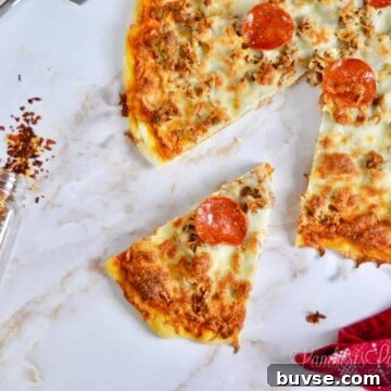 pizza with slice missing on a marble background.