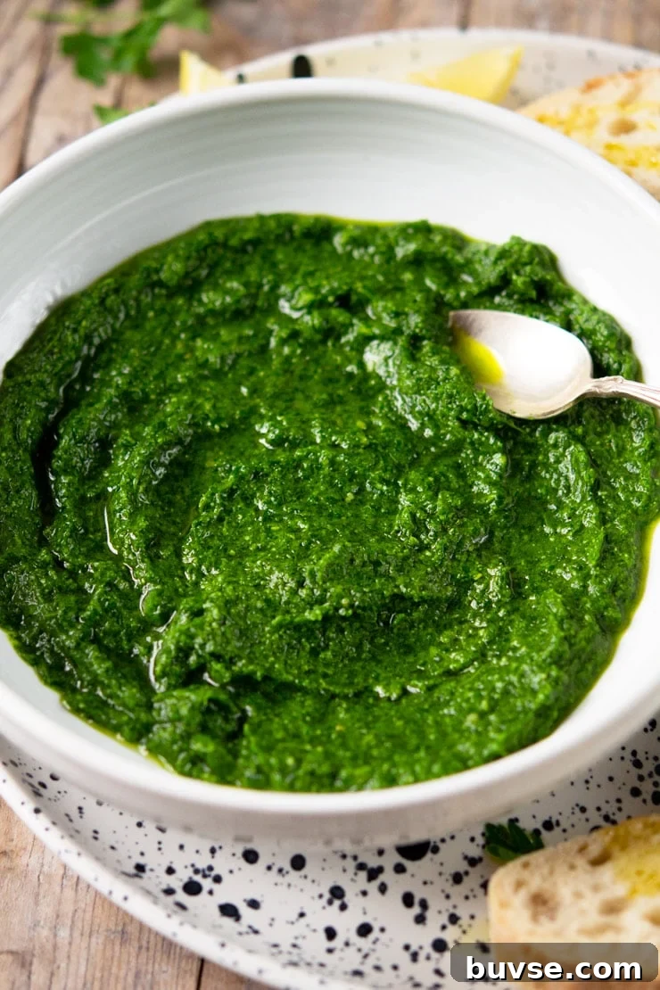 Parsley Pesto Recipe: Quick Homemade Pesto 4 A close up of parsley pesto in a white bowl