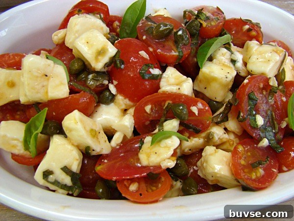 Low-Point Marinated Tomato and Mozzarella Salad Recipe 3 Bowl of marinated tomatoes and mozzarella