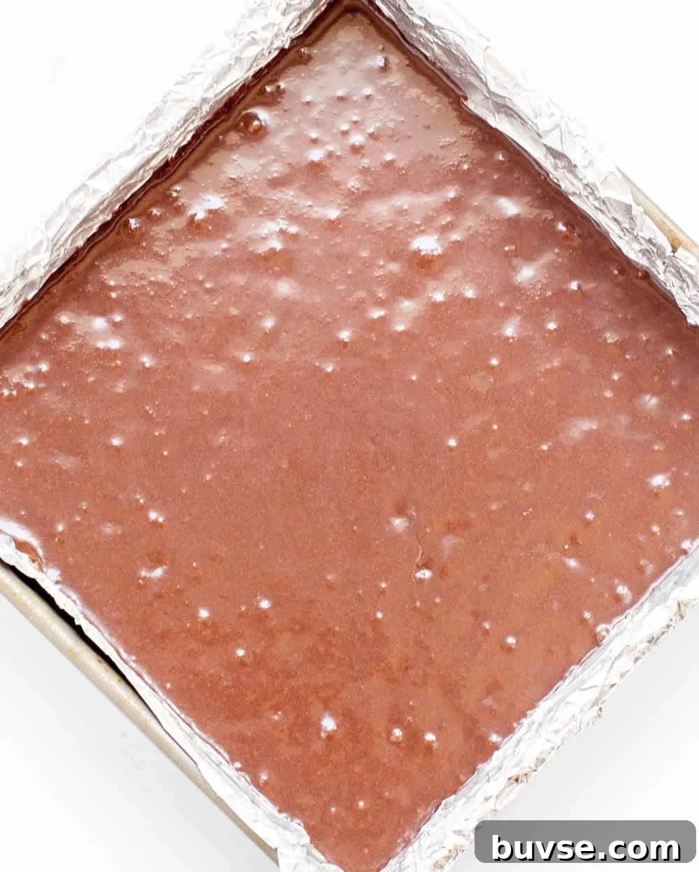 Fudgy Chocolate Zucchini Brownies Recipe 6 Finished fudgy zucchini brownies, cut into squares and chilled.