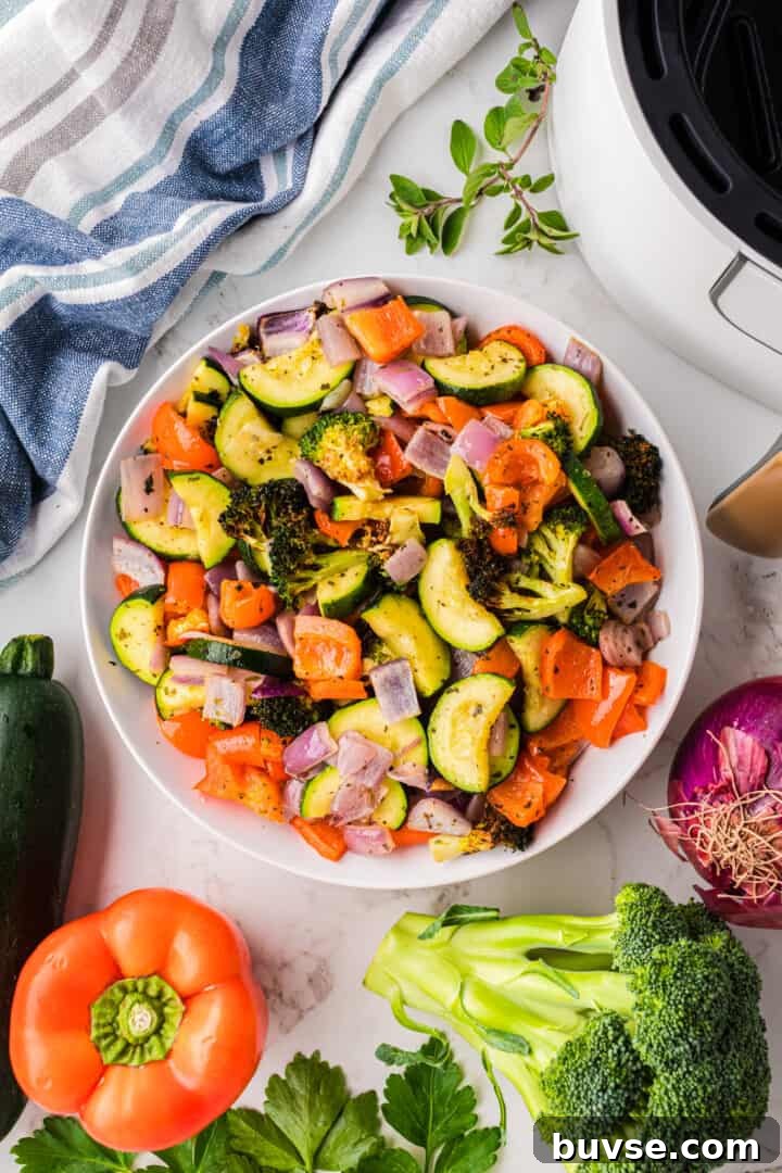 Crispy Air Fryer Vegetables: Quick Roasting Tips 2 Air Fryer Vegetables in white serving bowl.