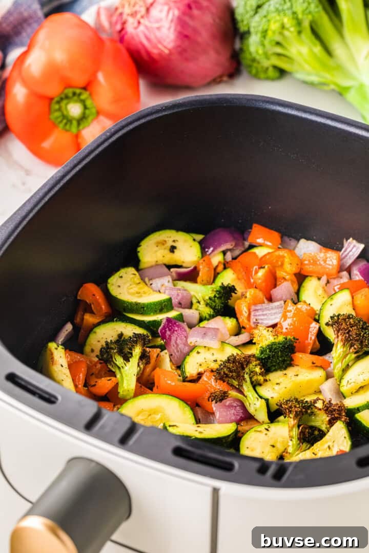 Crispy Air Fryer Vegetables: Quick Roasting Tips 10 air fryer vegetables in the air fryer basket.