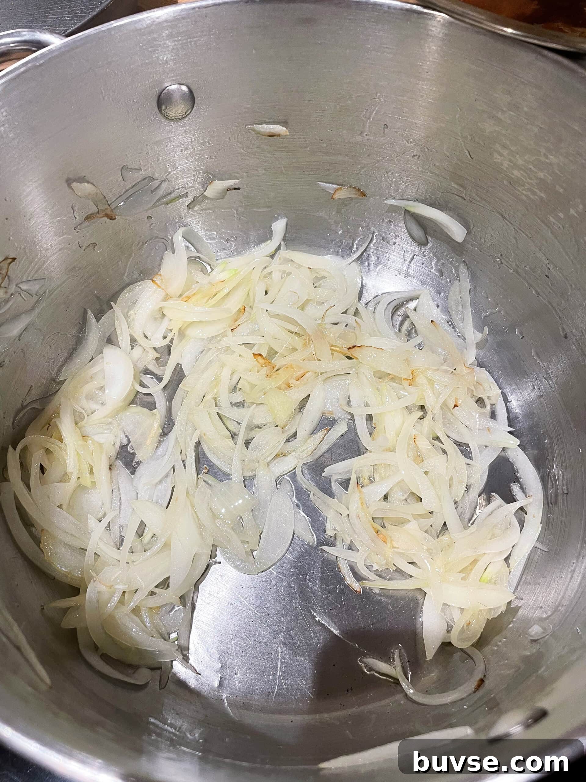 Mutton Yakhni Pulao Recipe: Aromatic Eid Rice Dish 3 Frying onions