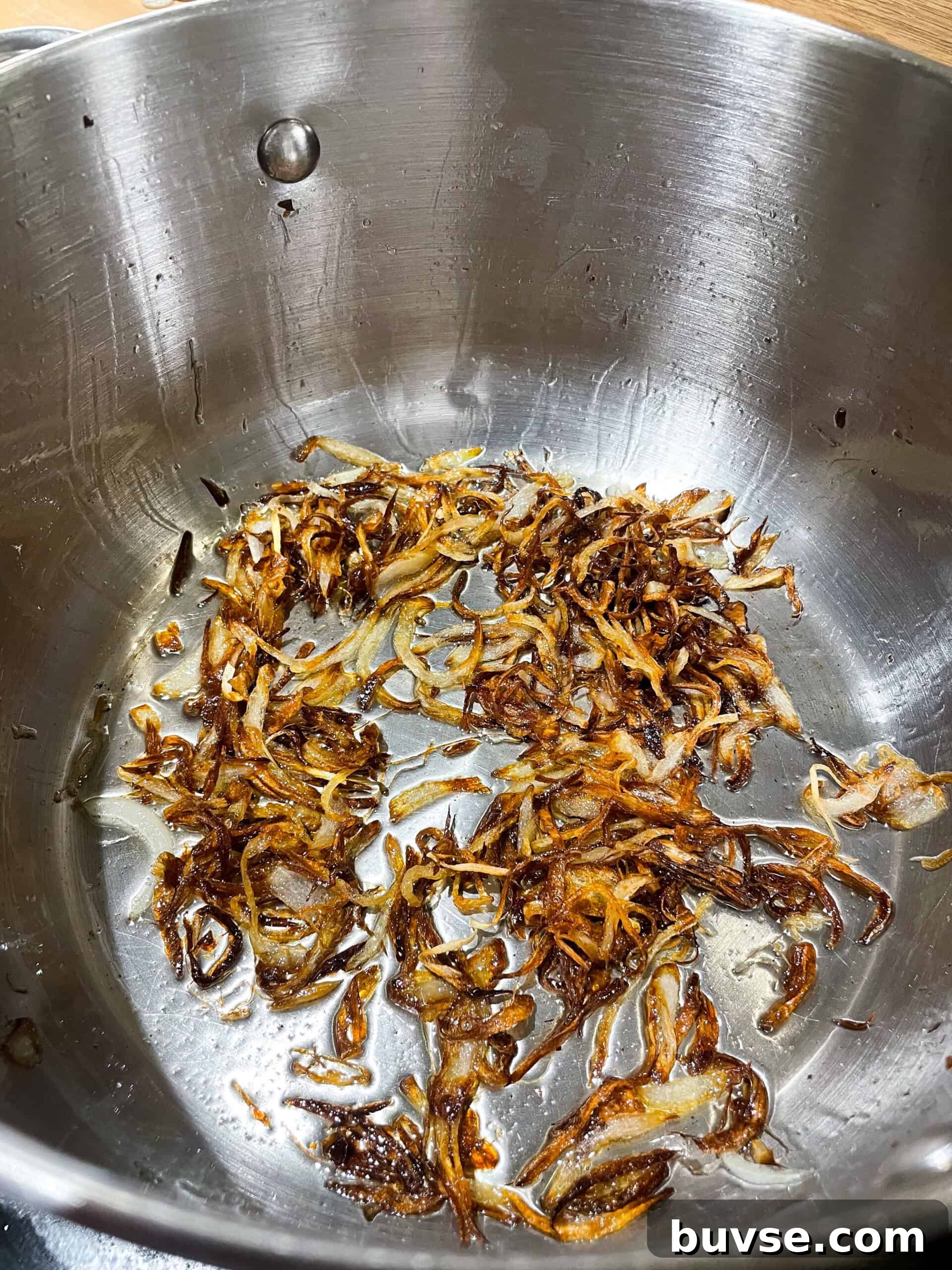 Mutton Yakhni Pulao Recipe: Aromatic Eid Rice Dish 4 Caramelized onions