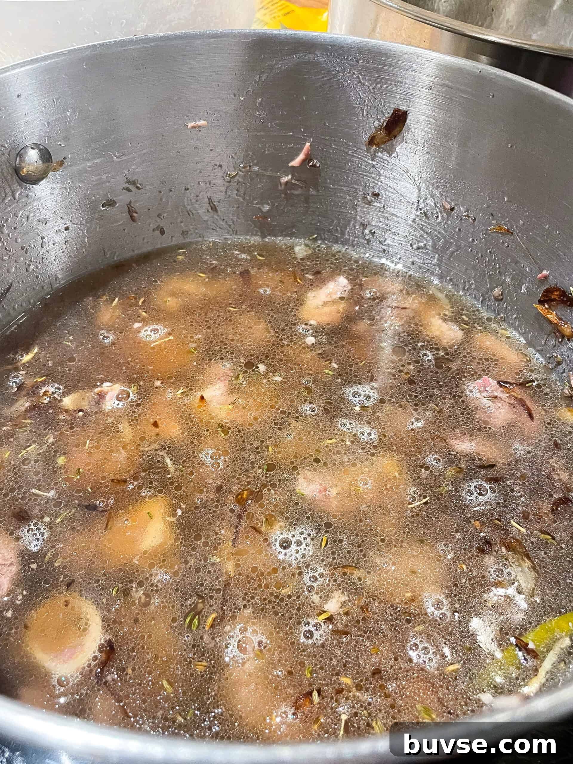 Mutton Yakhni Pulao Recipe: Aromatic Eid Rice Dish 7 Rice at parboil stage