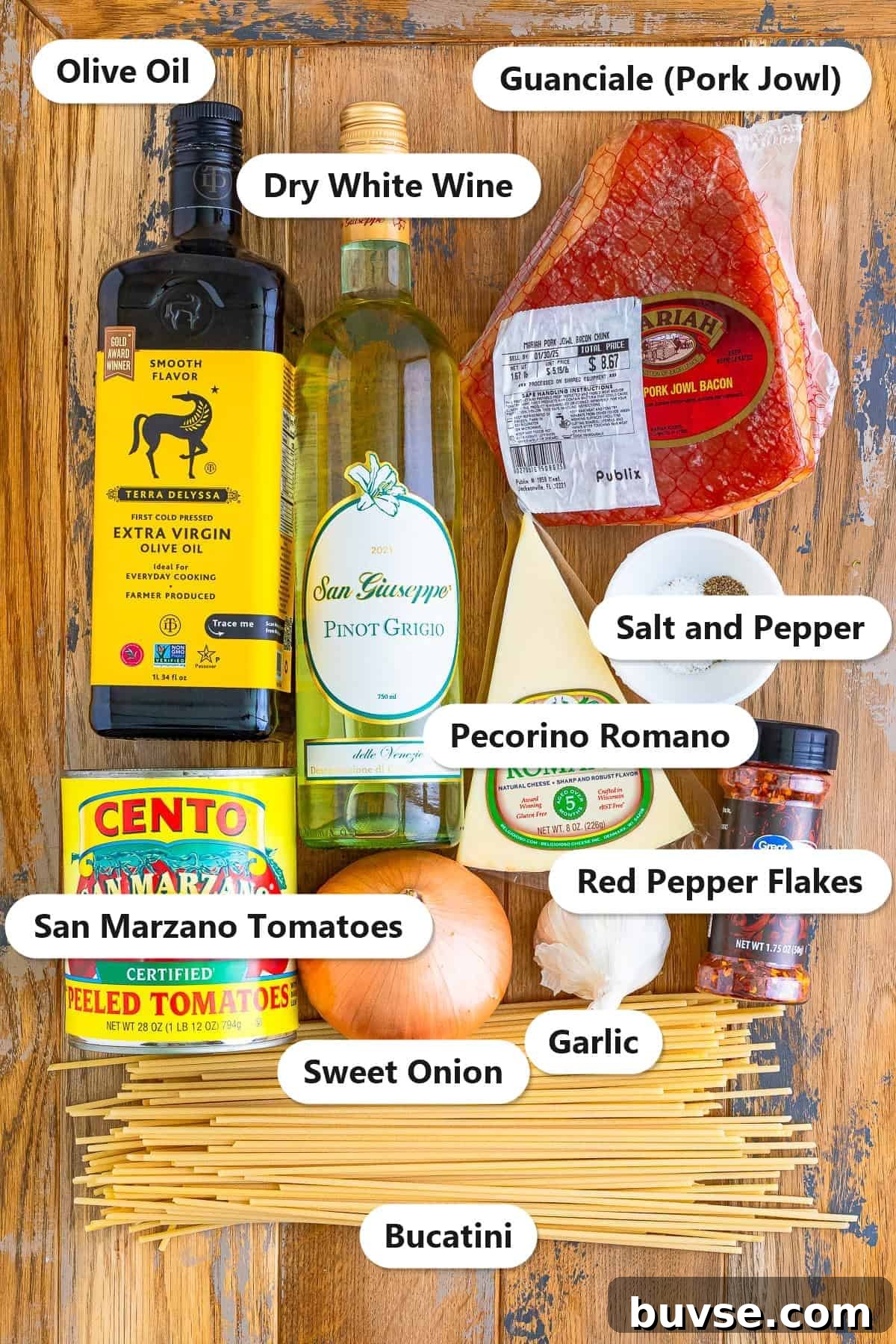 Amatriciana Pasta (Bucatini) - Authentic Italian Recipe 3 Labeled ingredients for Pasta Amatriciana: guanciale, San Marzano tomatoes, bucatini, pecorino romano, olive oil, white wine, onion, garlic, and red pepper flakes.