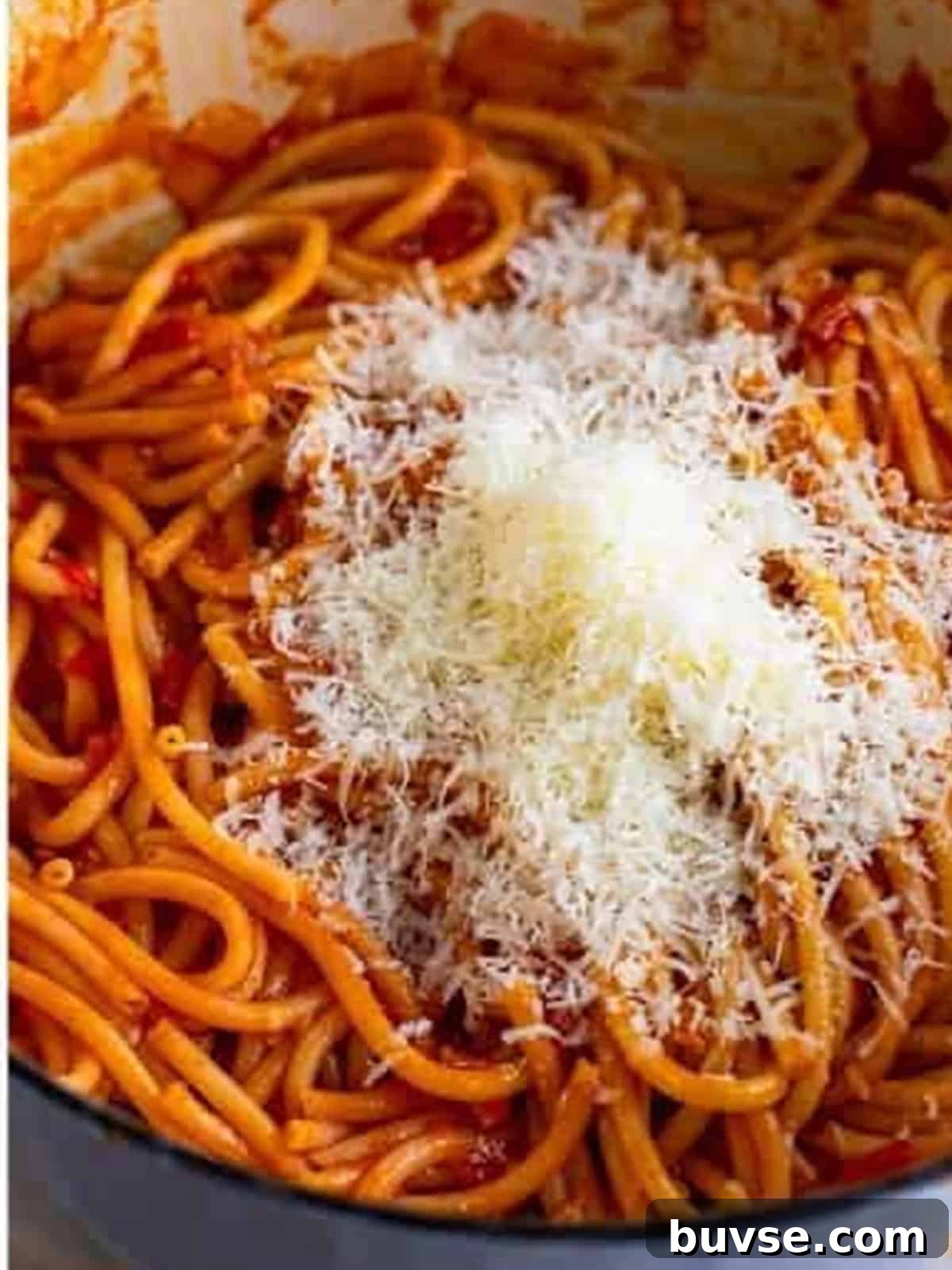 Amatriciana Pasta (Bucatini) - Authentic Italian Recipe 9 Freshly grated pecorino romano stirred into the finished Pasta Amatriciana.