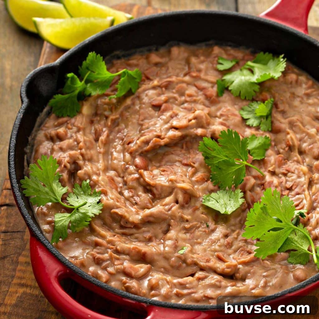 Cook Once, Eat Twice: Budget Recipes for Delicious Leftovers 7 A skillet with homemade refried beans