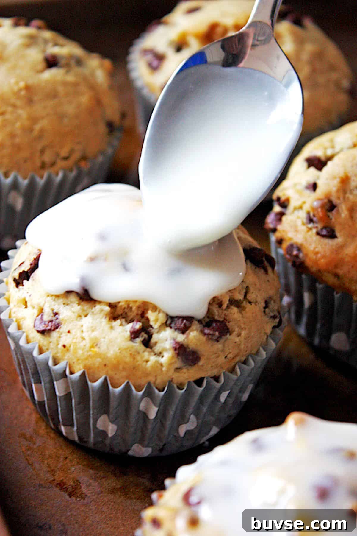 banana nut chocolate chip muffins with glaze