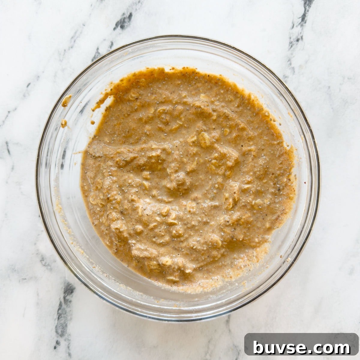 Mixed base of pumpkin overnight oats ready to be portioned and chilled.