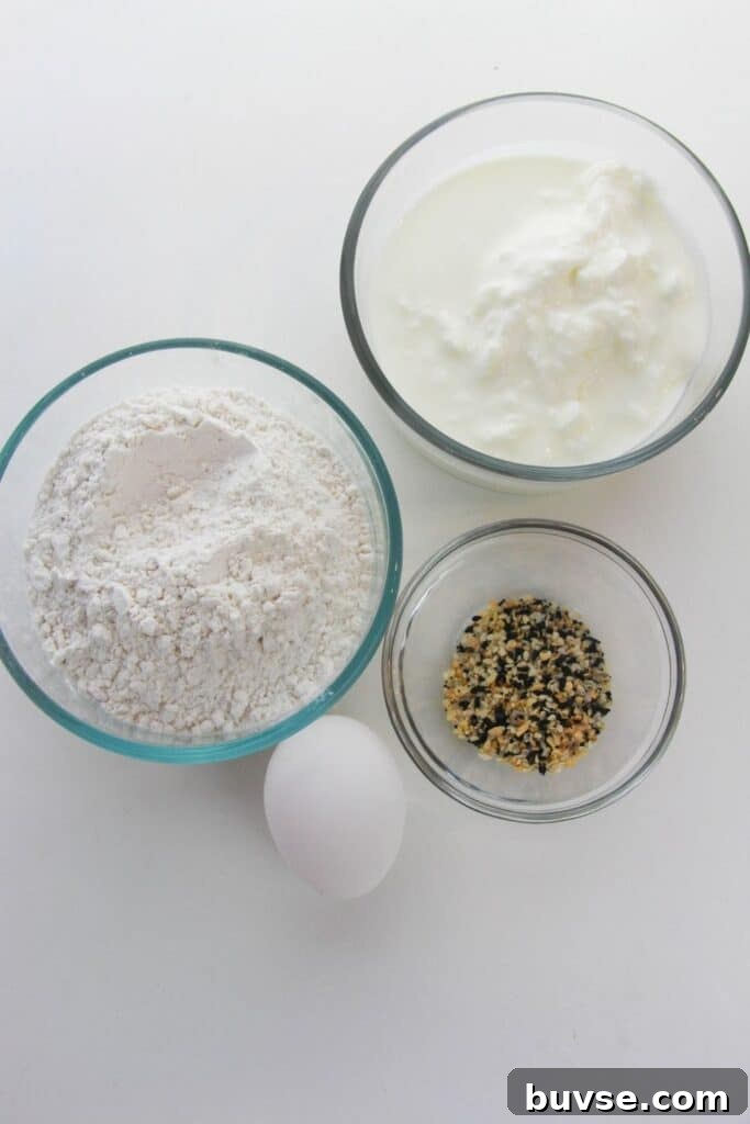 greek yogurt bagel ingredients on white table 