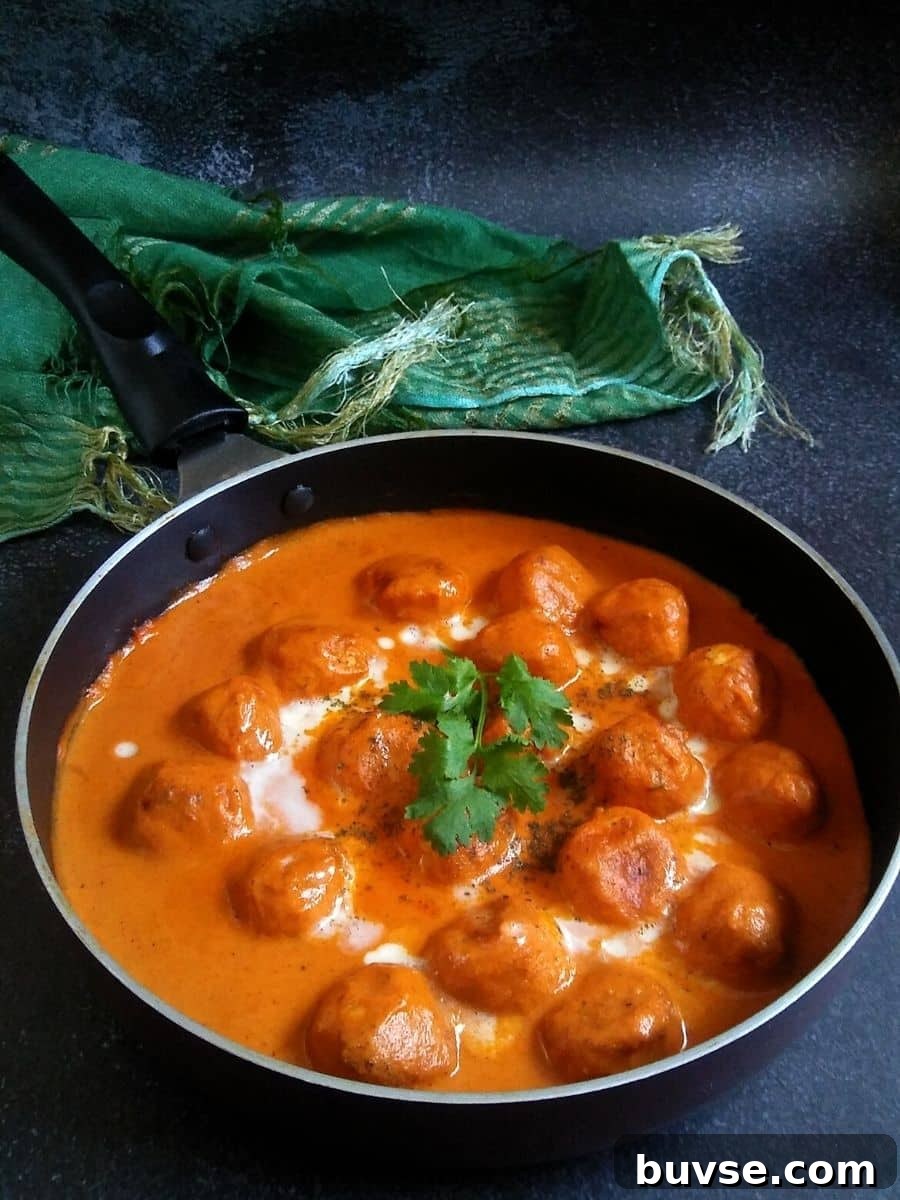 Chicken Meatballs in rich, vibrant Butter Sauce.