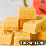 Pieces of pumpkin fudge served on a plate.