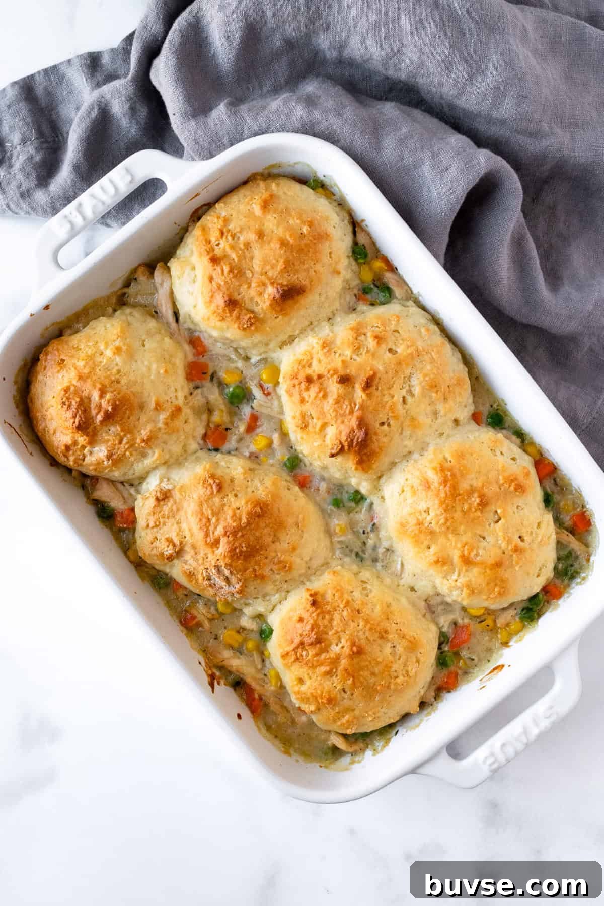 Biscuit Chicken Pot Pie in a white baking dish.