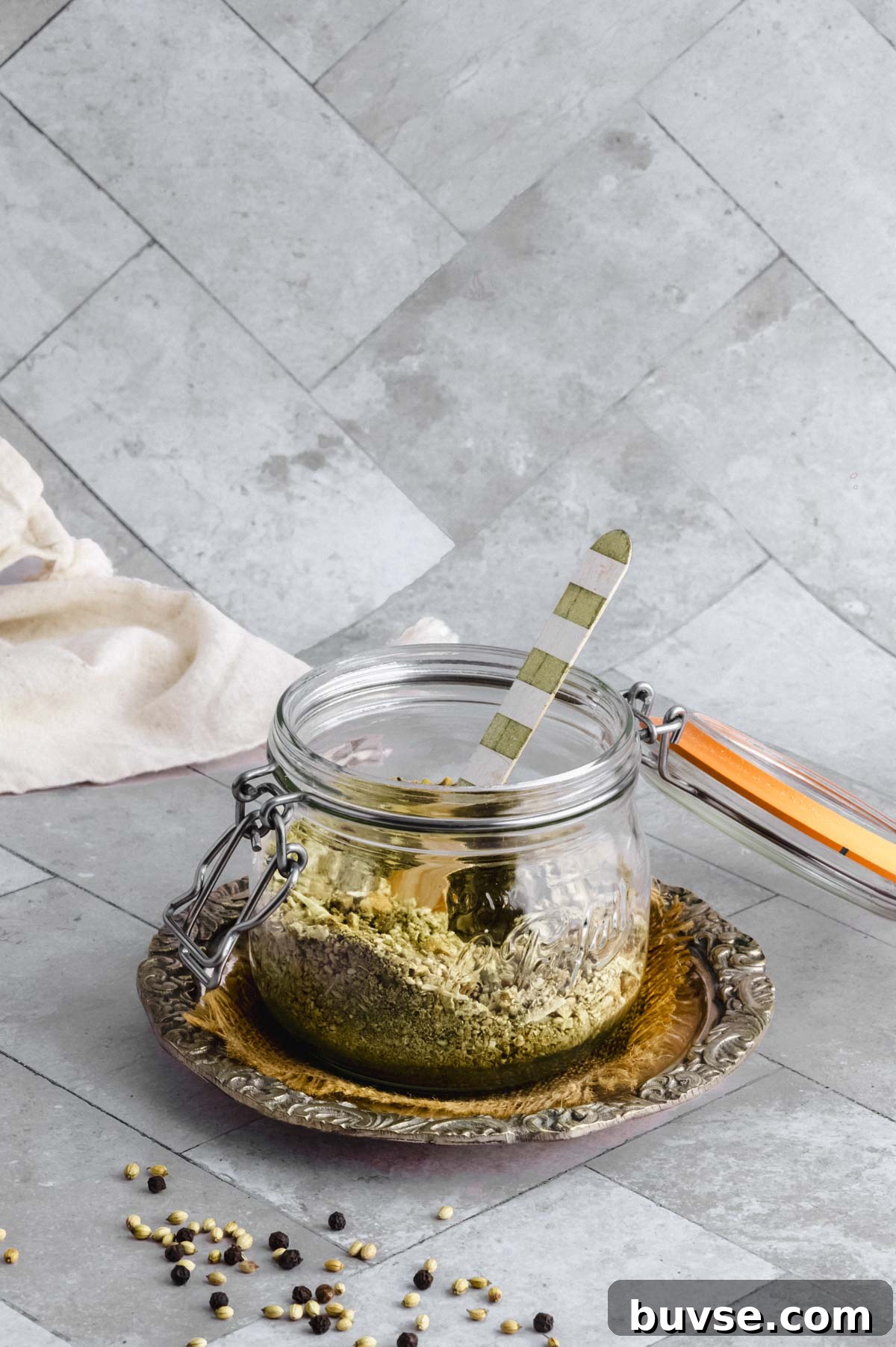 Dukkah in a jar with the lid open