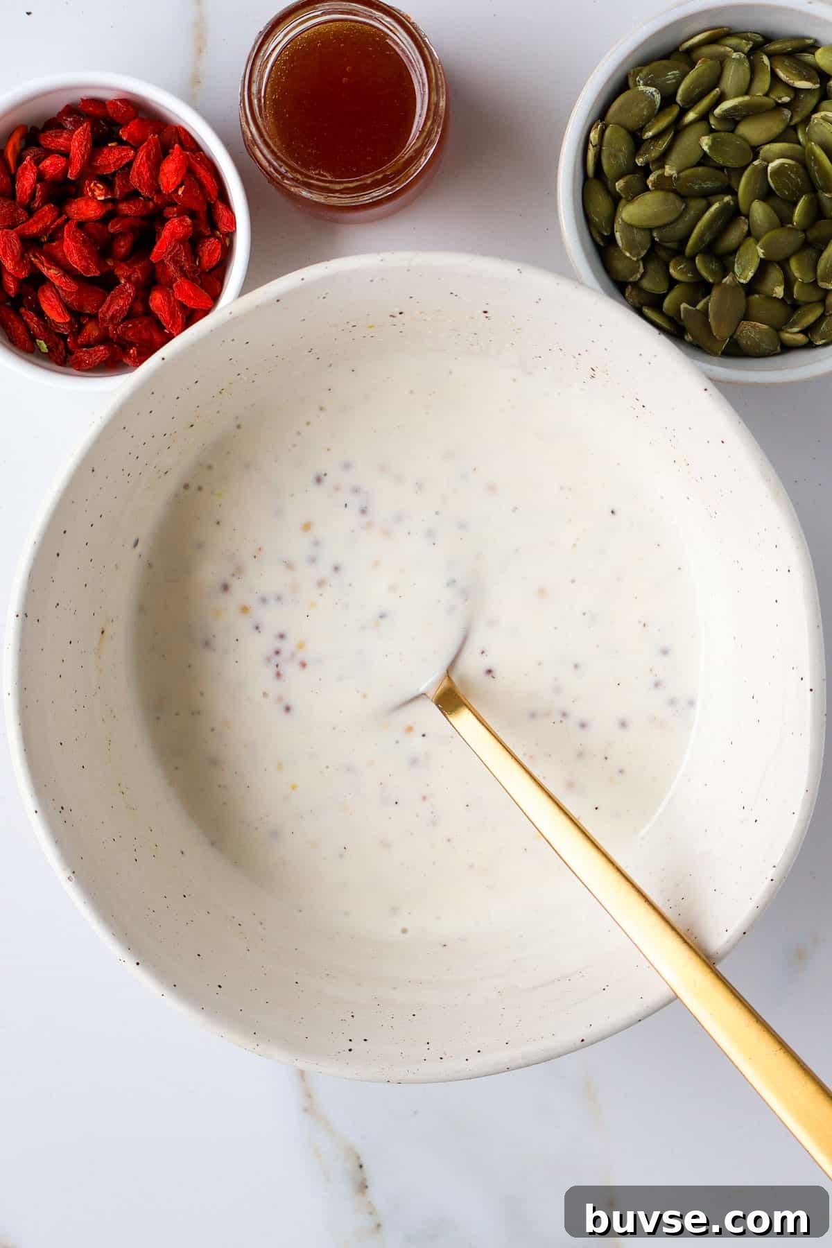 Yogurt dressing in a bowl.
