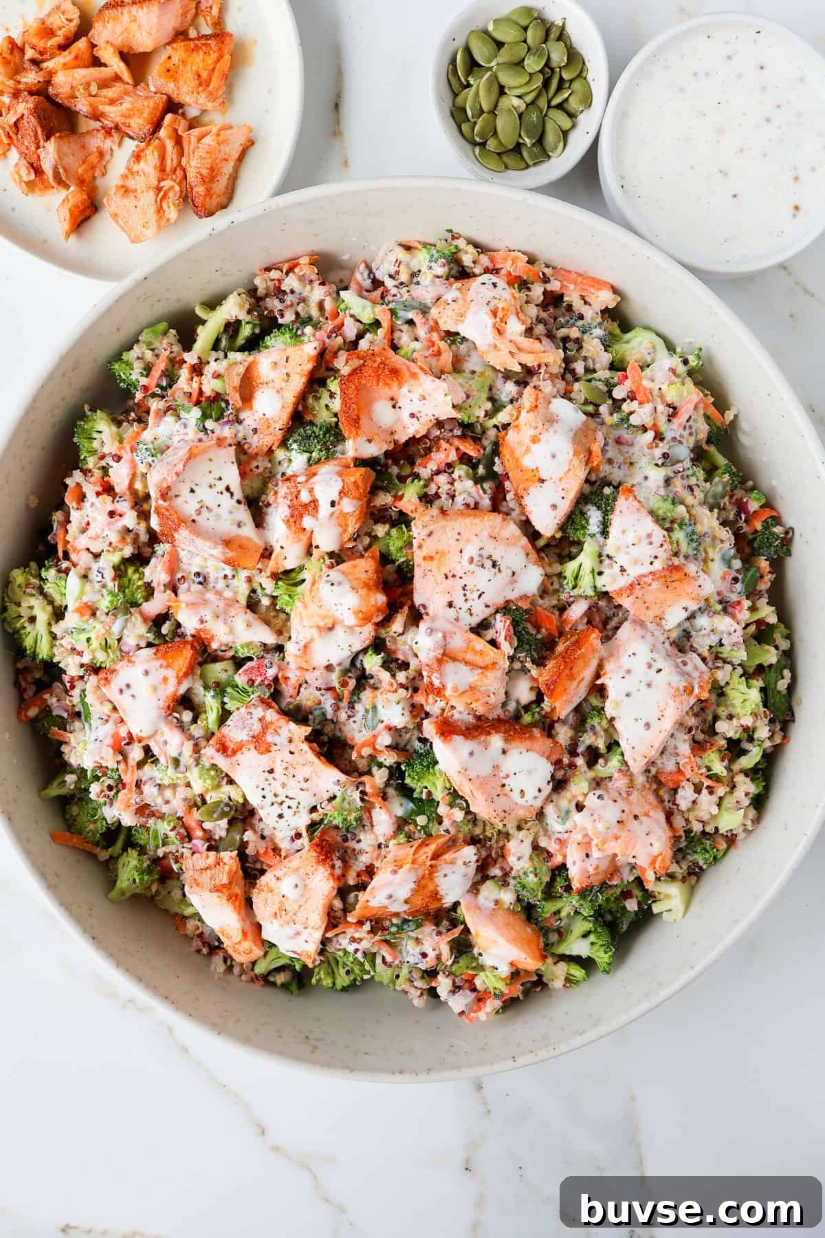 Salmon quinoa salad in a bowl.