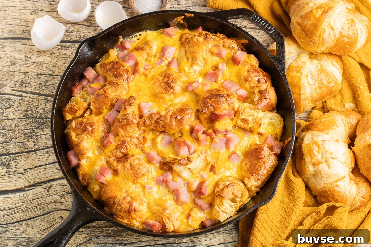 skillet breakfast casserole with ham and cheese and croissants