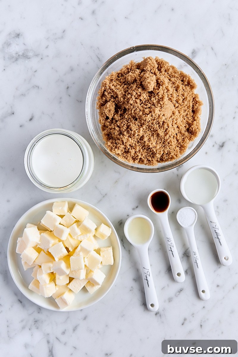 Homemade 5-Minute Butterscotch Sauce 4 Ingredients for homemade butterscotch sauce on white marble background
