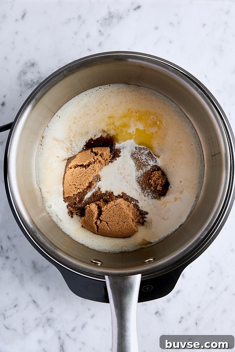 Homemade 5-Minute Butterscotch Sauce 6 Dark brown sugar, heavy cream, and lemon juice added to saucepan with melted butter
