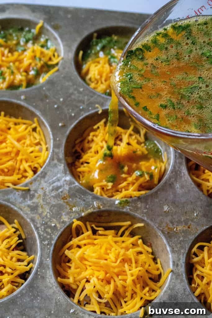Keto Bacon and Egg Muffins Recipe 5 Eggs poured into muffin tin