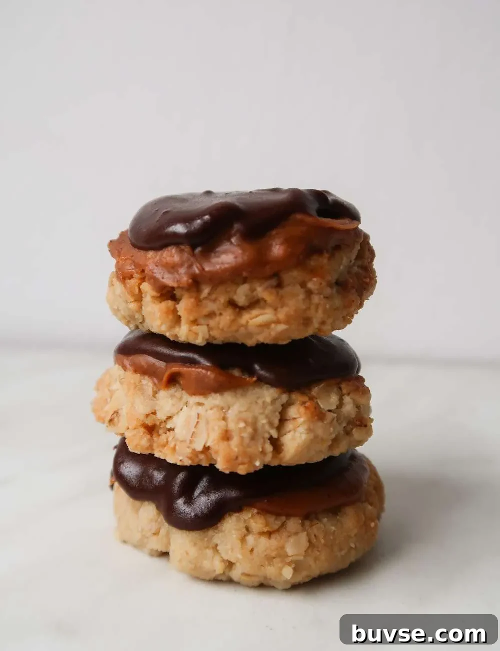 Easy healthy shortbread cookies! This simple vegan cookie recipe is made with almond flour, oats, coconut oil and maple syrup and is a delicious healthy dessert!