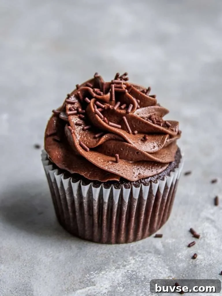 How to Make Chocolate Buttercream Frosting 3 chocolate buttercream frosting on chocolate cupcake (1)
