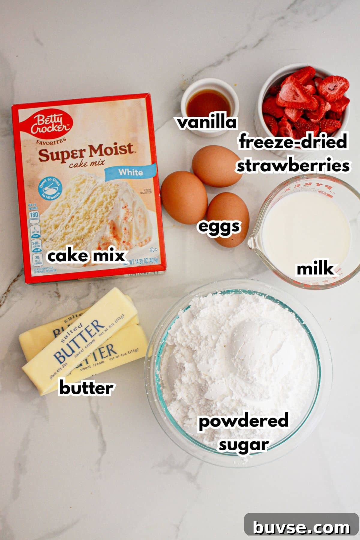 Vanilla Sheet Cake Recipe with Strawberry Frosting 4 Ingredients on a counter.